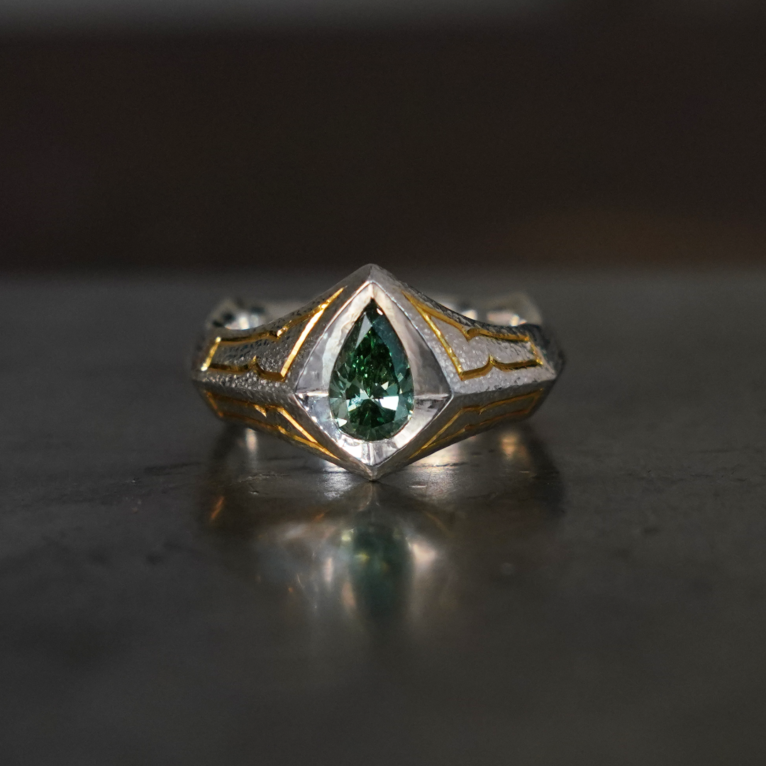gilt green diamond shield