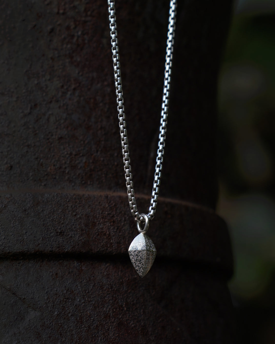 red diamond shield amulet