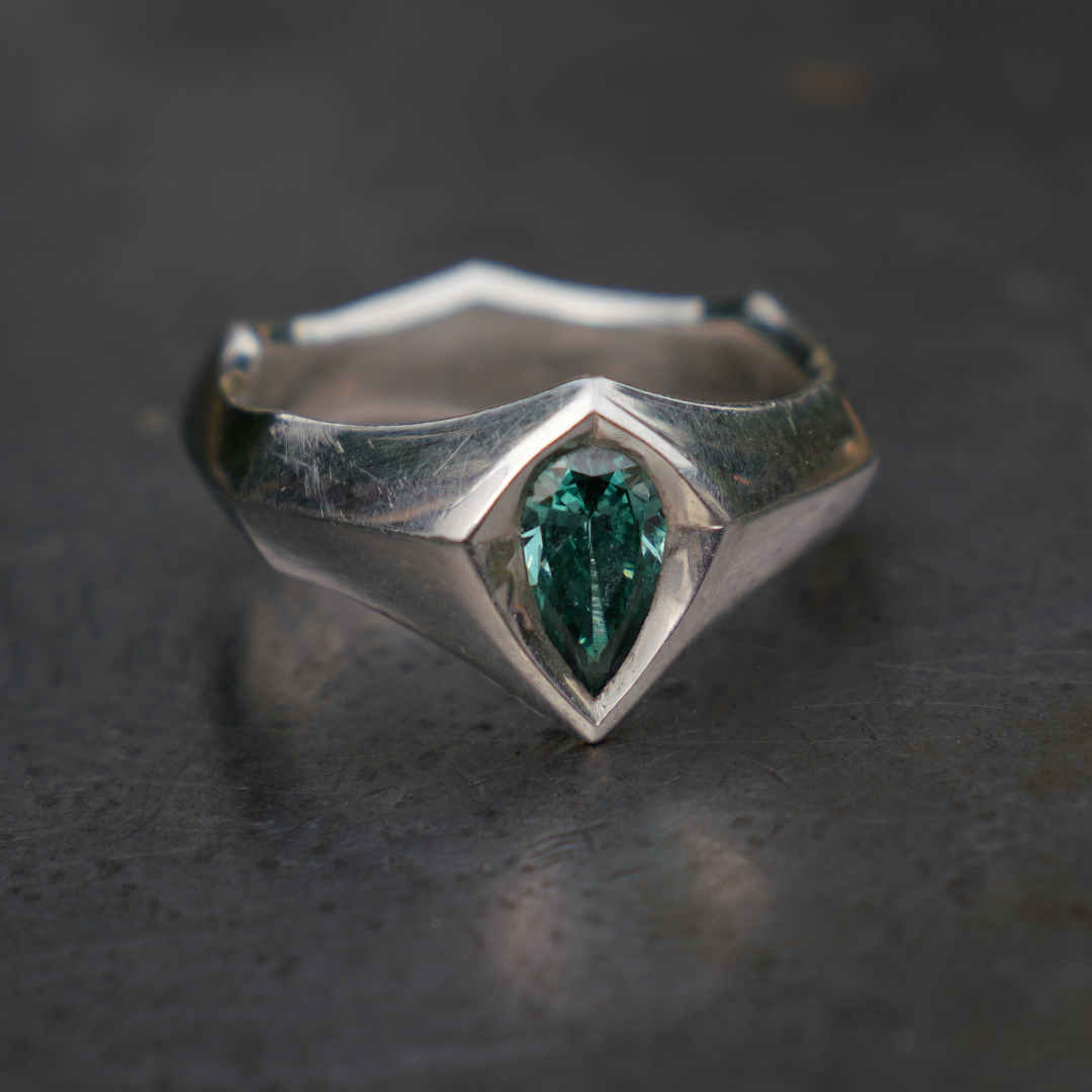 teal diamond sheild ring