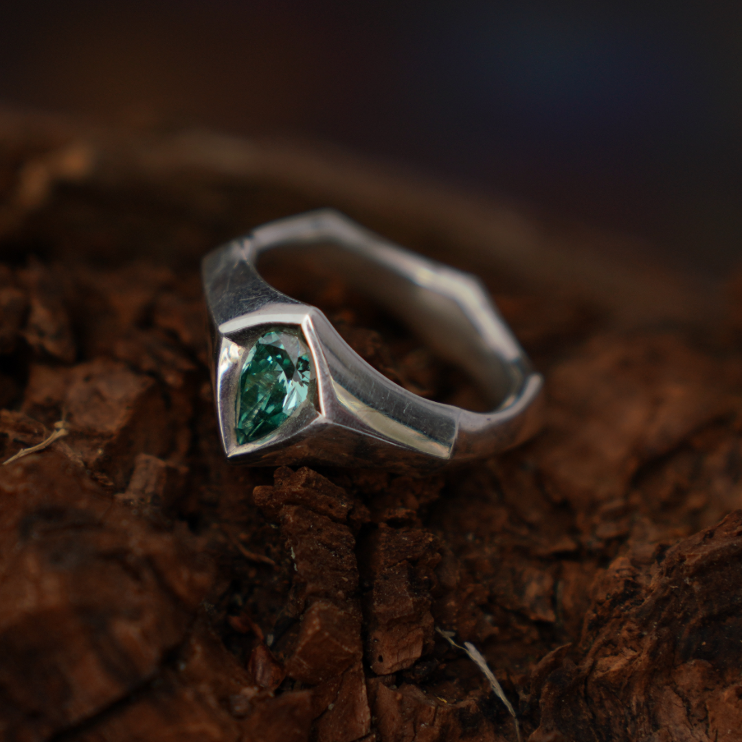 teal diamond sheild ring